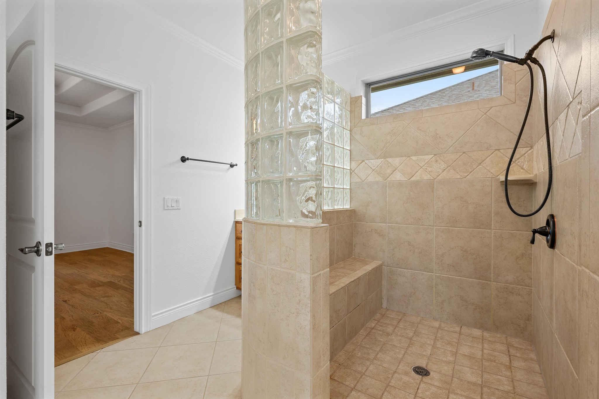815 River Walk Trail Georgetown, TX 78633 - Photo 21 of 36 a bathroom with a glass shower door