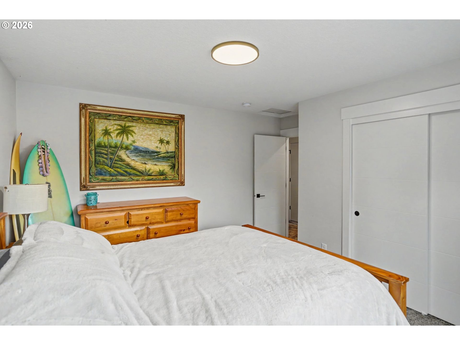 5520 Crossler Meadow Loop South Salem, OR 97306 - Photo 28 of 40 a bedroom with a bed and a painting on the wall