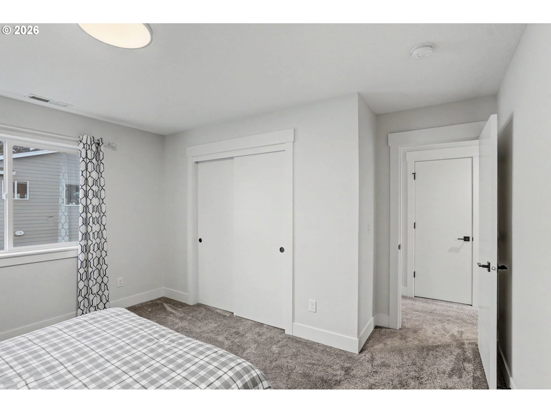 5520 Crossler Meadow Loop South Salem, OR 97306 - Photo 31 of 40 a room with a bed and a window