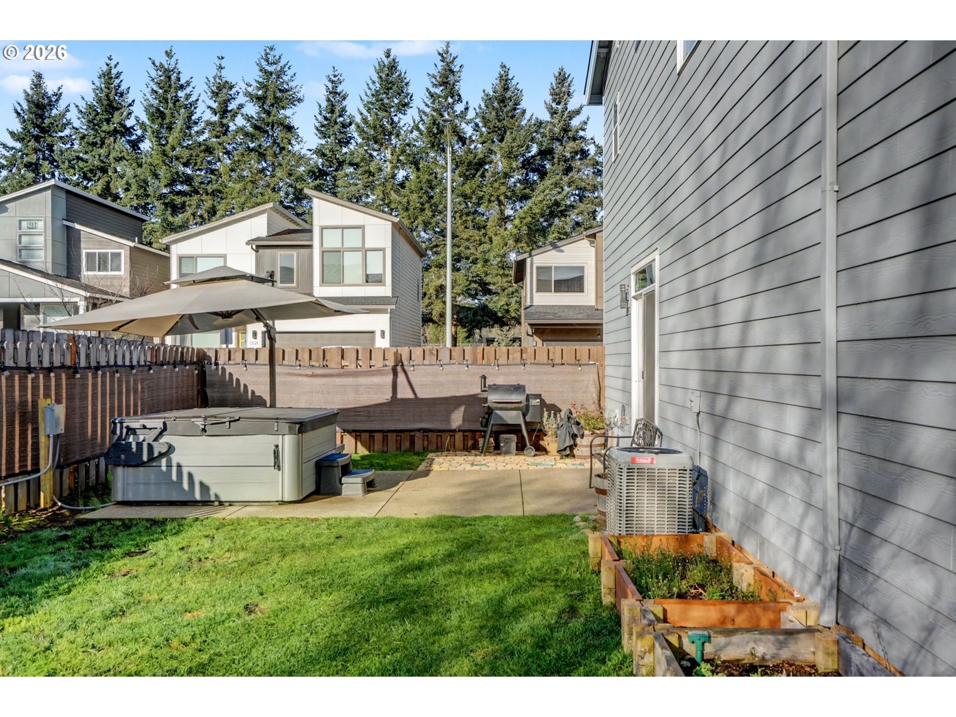5520 Crossler Meadow Loop South Salem, OR 97306 - Photo 5 of 40 a view of a house with backyard sitting area and garden