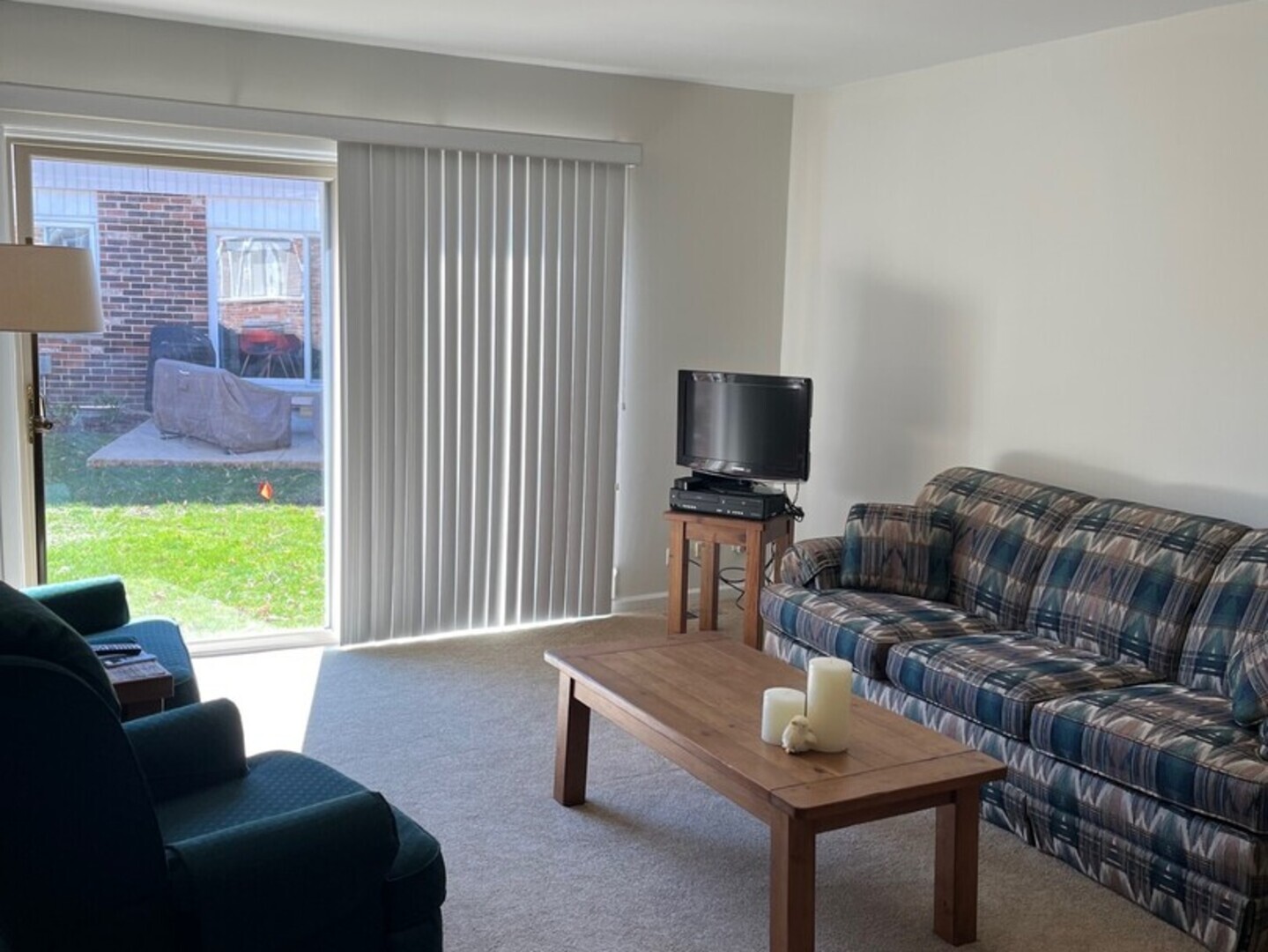 1690 Darwin Court Wheaton, IL 60189 - Photo 5 of 17 a living room with furniture and a flat screen tv