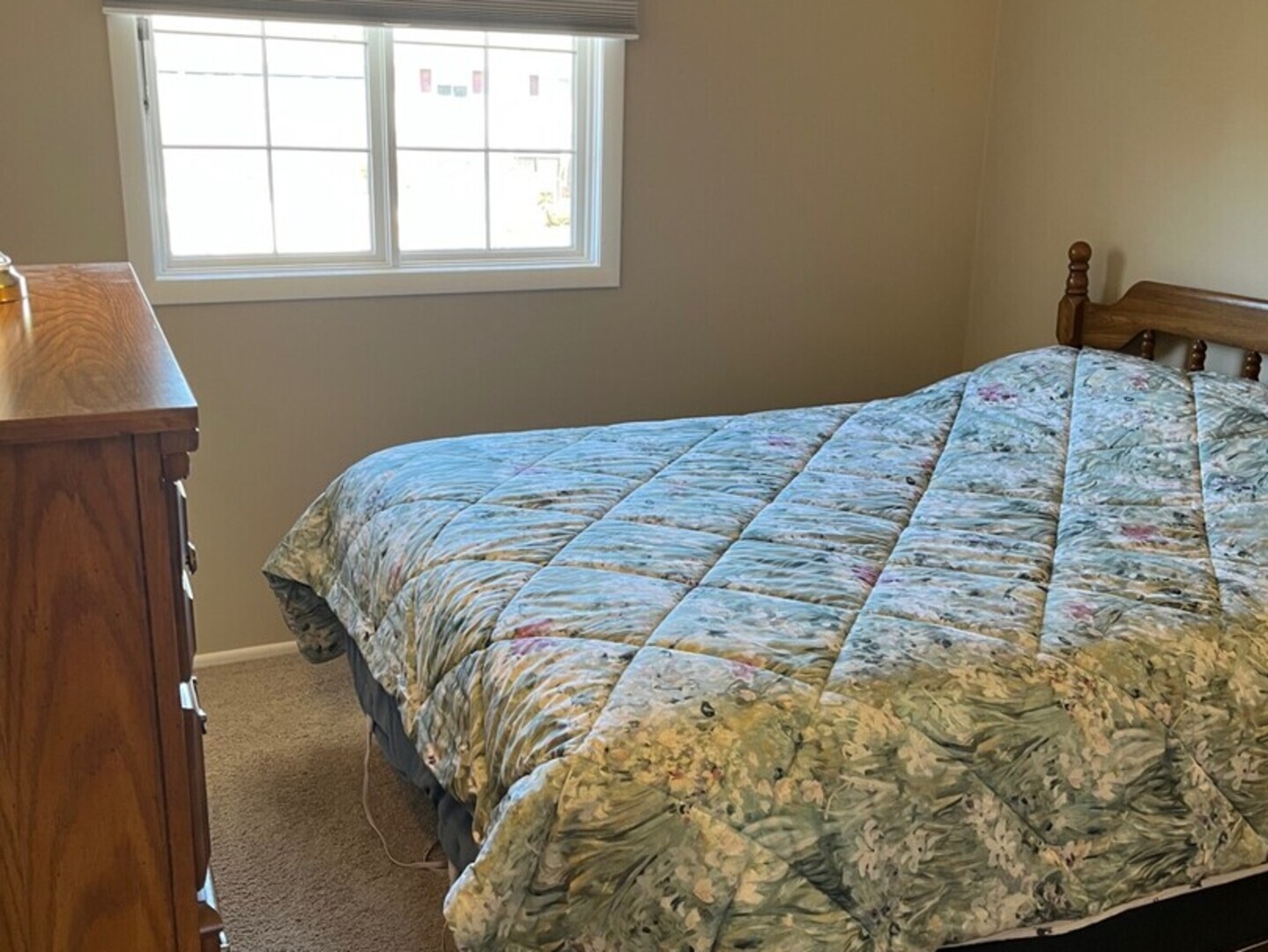 1690 Darwin Court Wheaton, IL 60189 - Photo 10 of 17 a bedroom with a bed and a window
