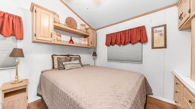 a bedroom with a bed and closet