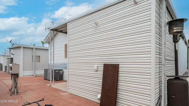 a view of a house with backyard