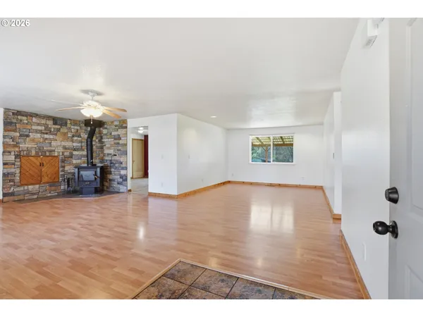 a view of a livingroom with wooden floor