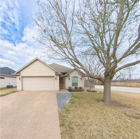 a house with trees in front of it