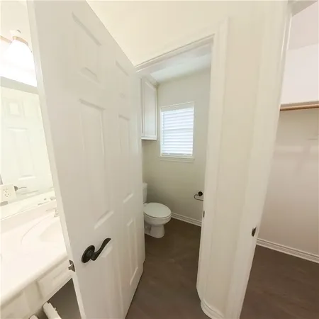 a view of bathroom with a toilet