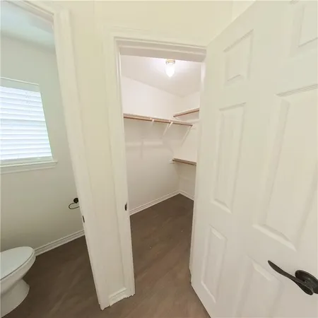 a bathroom with a double vanity sink and mirror
