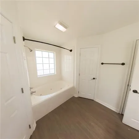 a bathroom with a bathtub