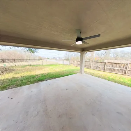 a view of a water heater and a big room