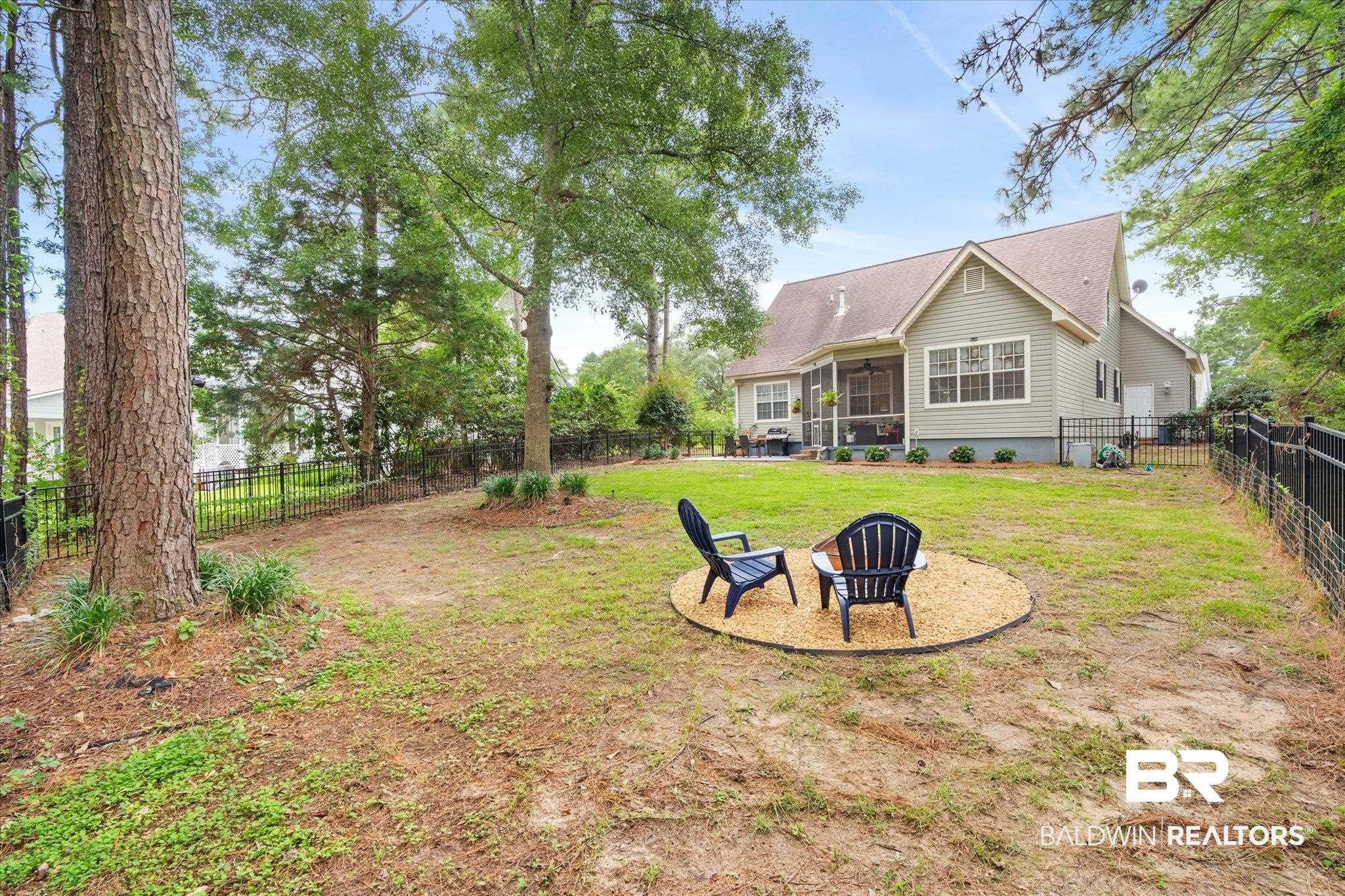 30648 Pine Court Daphne, AL 36527 - Photo 27 of 30 View of yard featuring a fire pit