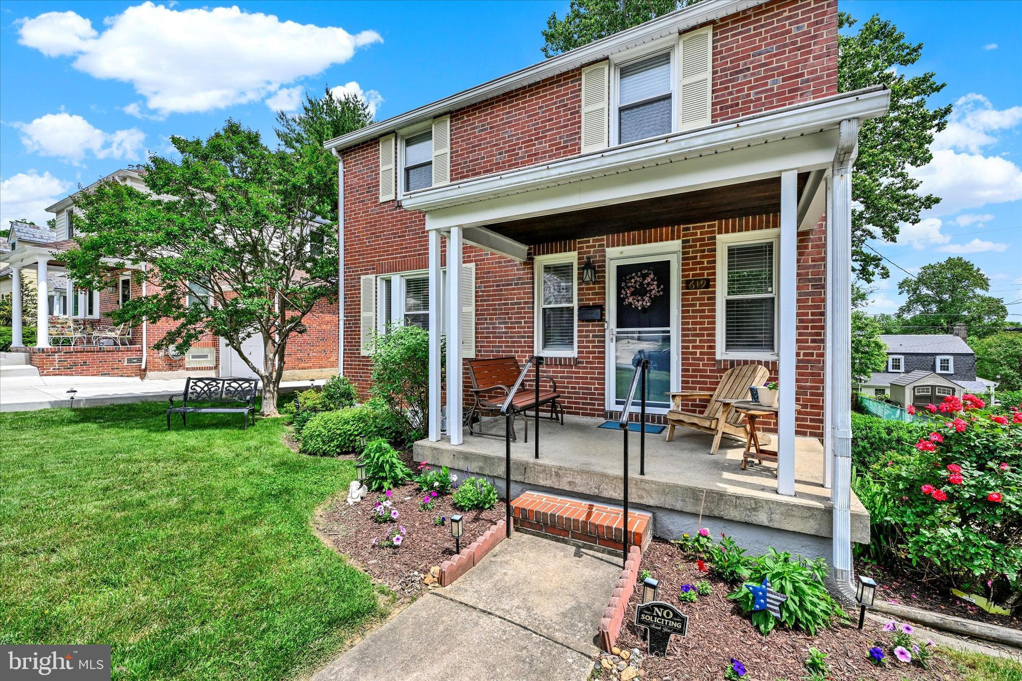 619 Warwick Road Baltimore, MD 21229 - Photo 4 of 41 a view of a house with a yard and sitting area
