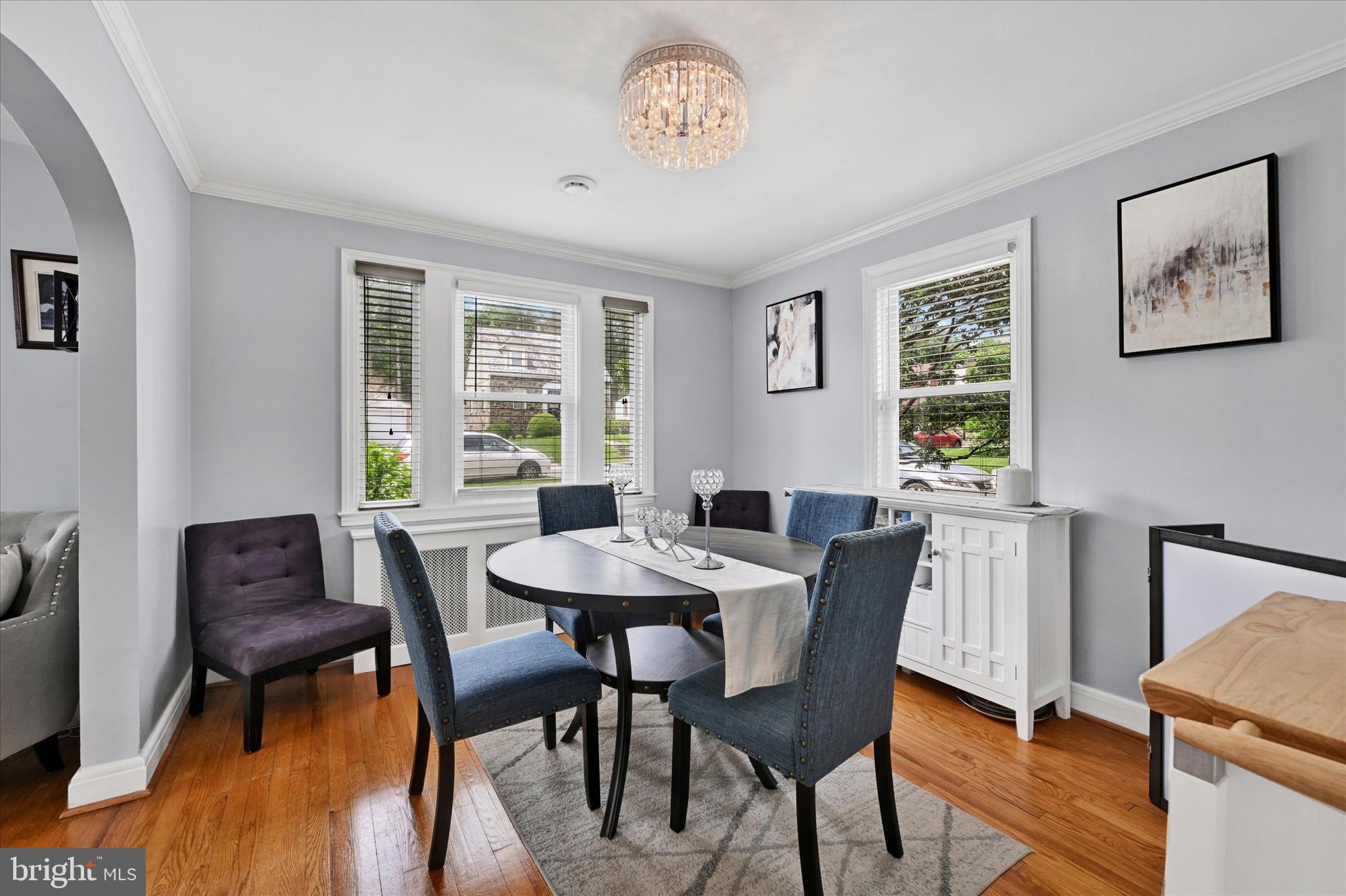 619 Warwick Road Baltimore, MD 21229 - Photo 9 of 41 a view of a dining room with furniture window and wooden floor