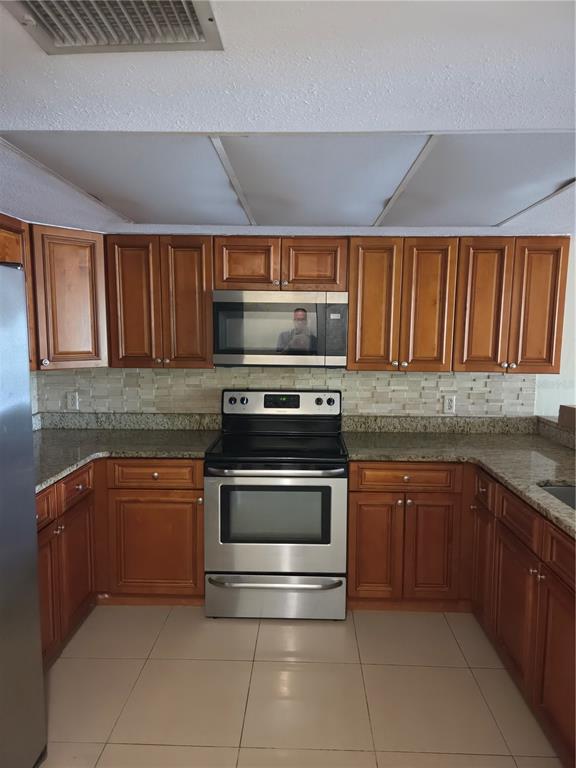 12025 Proctor Loop, Unit 2 New Port Richey, FL 34654 - Photo 3 of 14 Gallery Image 3