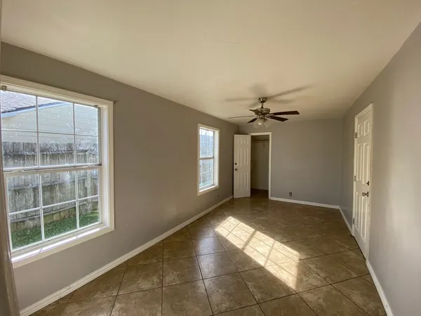 a bathroom with a shower and a toilet