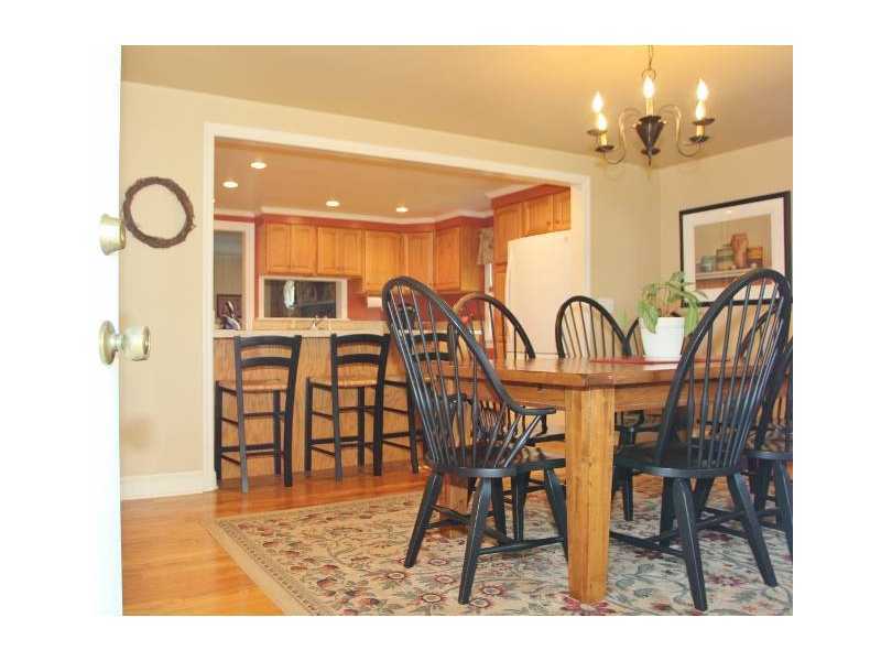 29 Riverside Lane Riverside, CT 06878 - Photo 3 of 20 a view of a dining room with furniture and chandelier