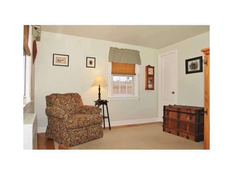 29 Riverside Lane Riverside, CT 06878 - Photo 10 of 20 a living room with furniture and a dresser