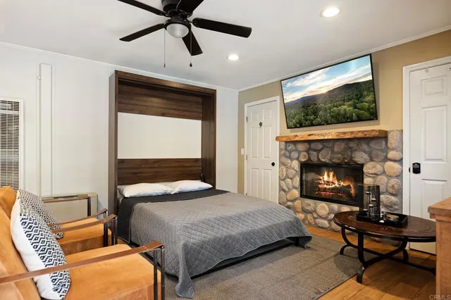 a bathroom with a sink mirror and tub