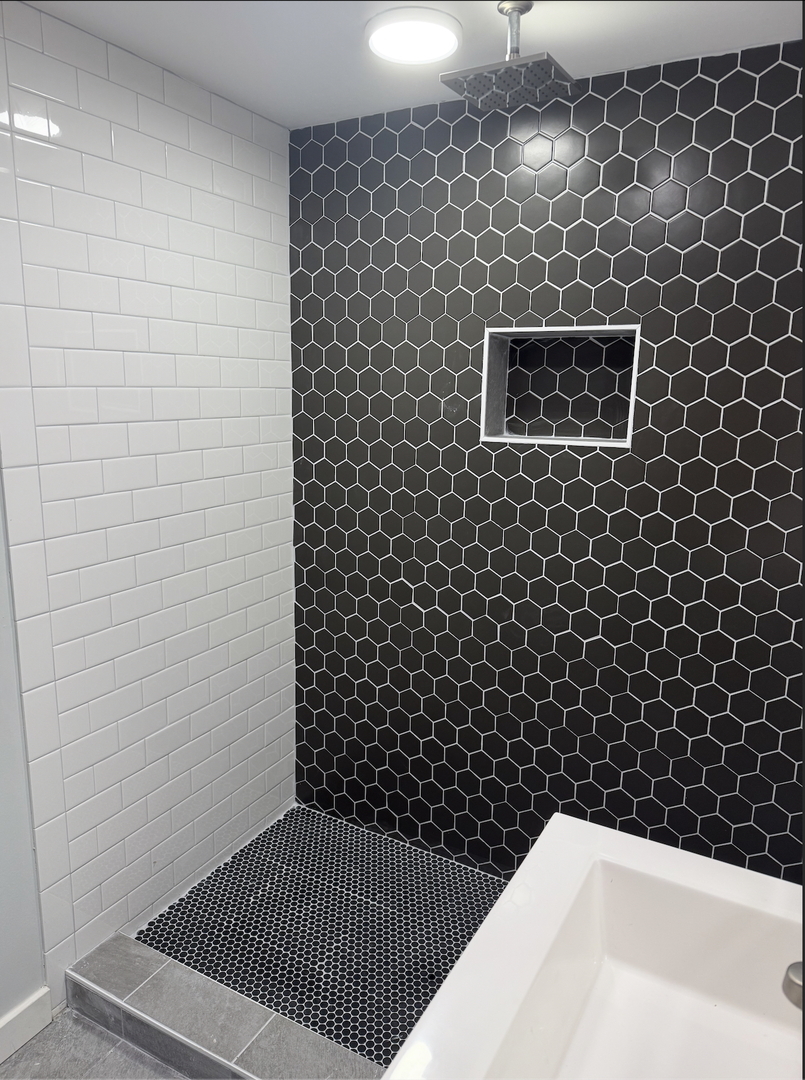 16879 Head Avenue Hazel Crest, IL 60429 - Photo 13 of 28 a bathroom with a black white checkered floor