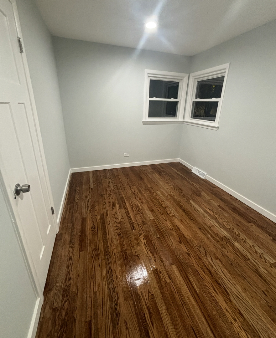 16879 Head Avenue Hazel Crest, IL 60429 - Photo 21 of 28 a view of wooden floor in a room