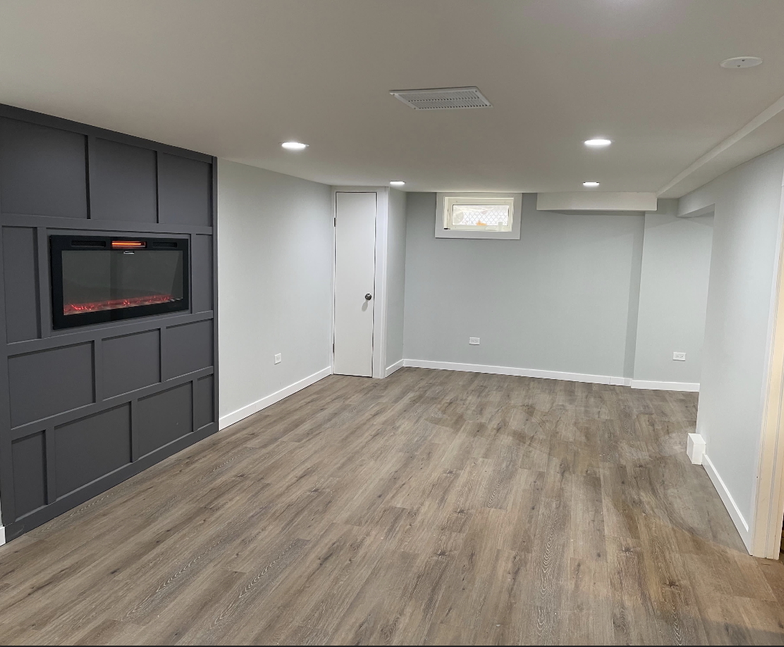 16879 Head Avenue Hazel Crest, IL 60429 - Photo 8 of 28 a view of empty room with wooden floor and fan