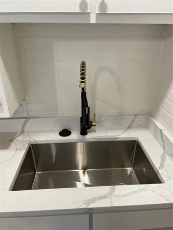 a view of a house with a yard and garage