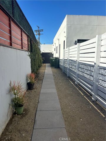 a view of a pathway with a house