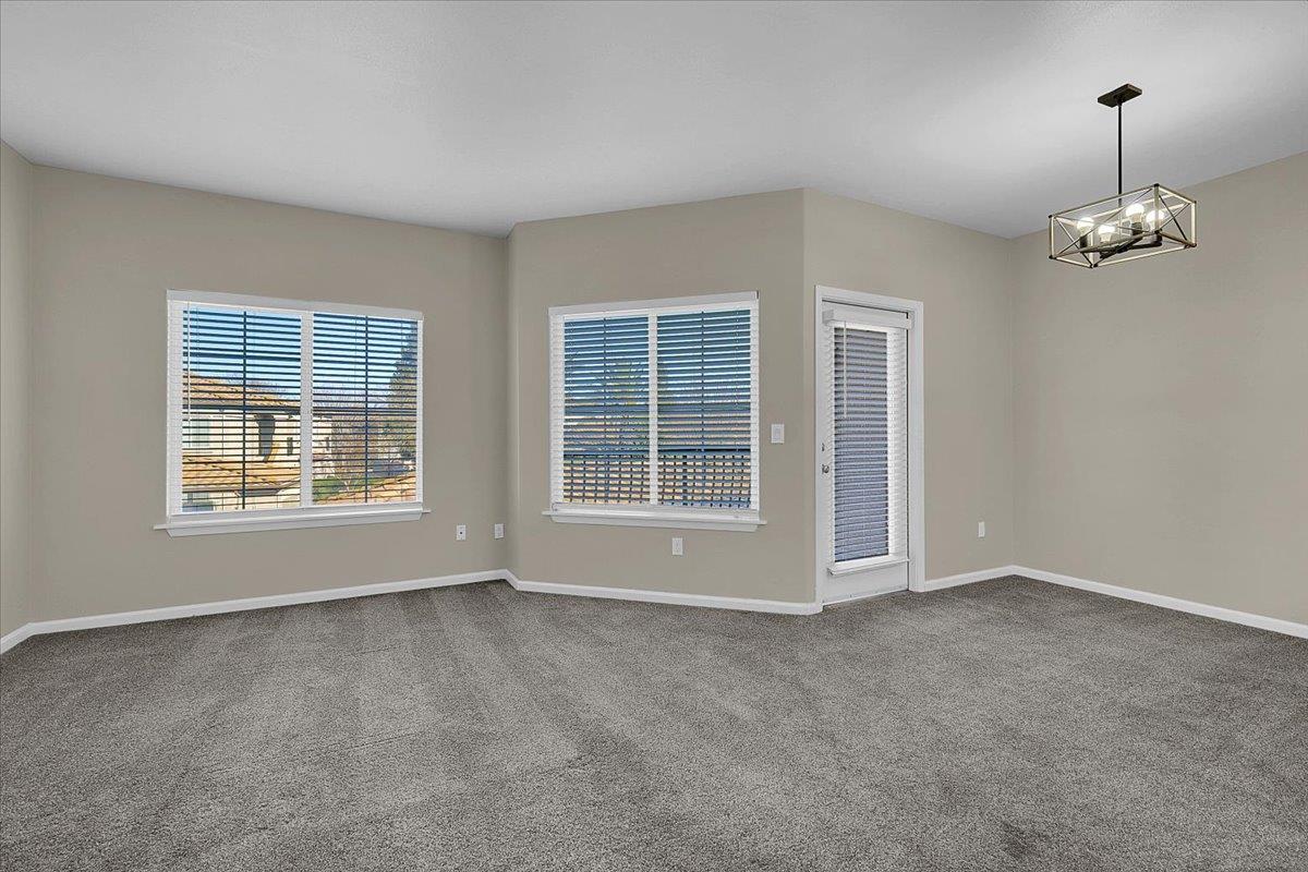 4200 East Commerce, Unit 1121 Sacramento, CA 95834 - Photo 11 of 24 an empty room with windows