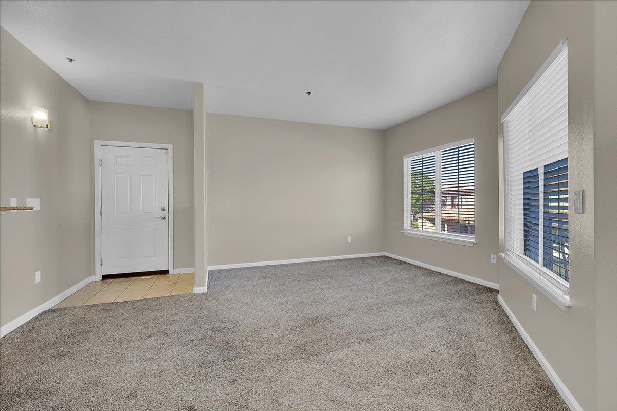4200 East Commerce, Unit 1121 Sacramento, CA 95834 - Photo 4 of 24 an empty room with windows