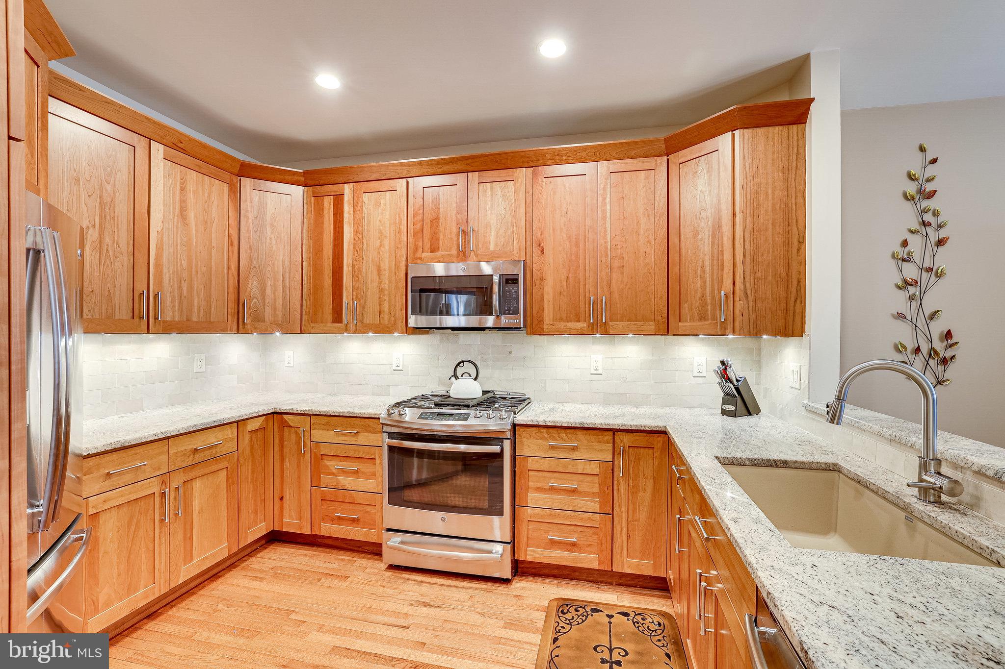 1223 Woodbrook Court Reston, VA 20194 - Photo 13 of 86 Natural Cherry Cabinets
