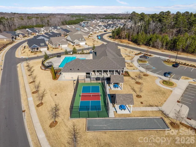 a front view of a house with swimming pool
