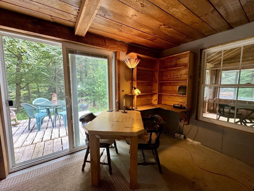 73 Green River Road Colrain, MA 01340 - Photo 8 of 26 a dining room with furniture and window