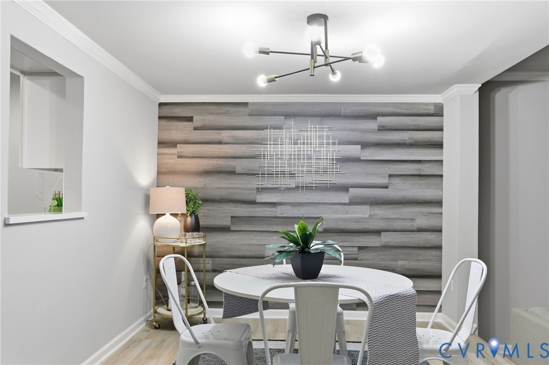 11735 South Briar Patch Drive Midlothian, VA 23113 - Photo 12 of 48 a dining room with furniture and wooden floor