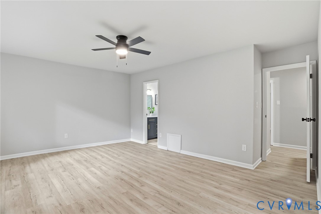 11735 South Briar Patch Drive Midlothian, VA 23113 - Photo 23 of 48 a view of an empty room with wooden floor