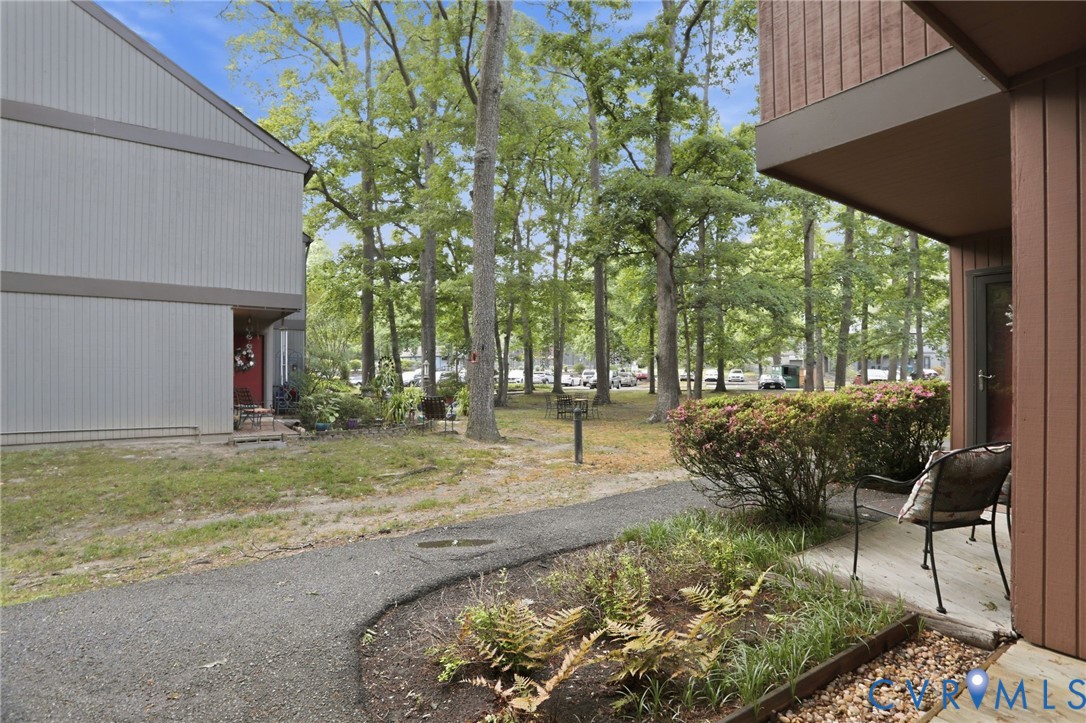 11735 South Briar Patch Drive Midlothian, VA 23113 - Photo 42 of 48 a view of a house with backyard and sitting area