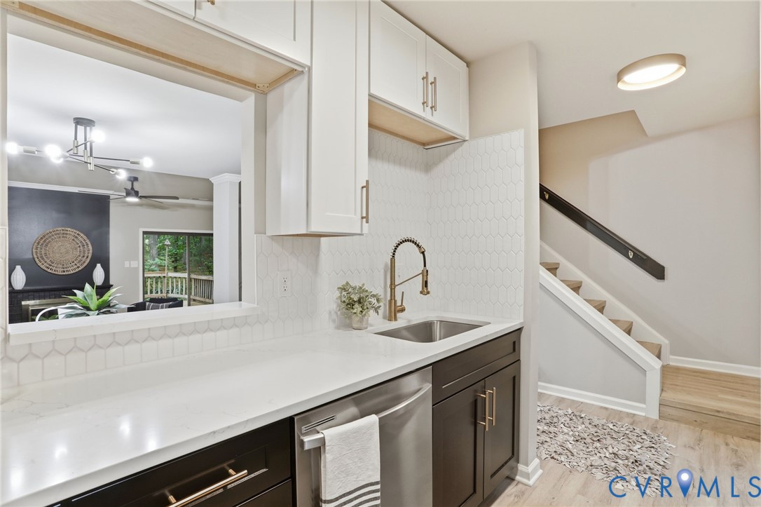 11735 South Briar Patch Drive Midlothian, VA 23113 - Photo 8 of 48 a kitchen with a sink cabinets and window