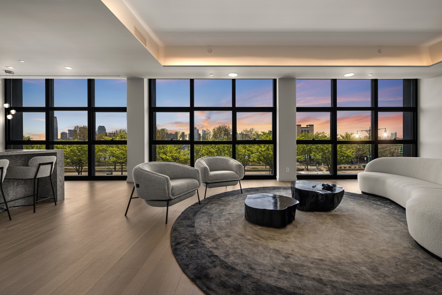 290 West Street, Unit 2B Manhattan, NY 10013 - Photo 2 of 14 a living room with furniture and a floor to ceiling window