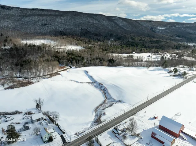 a view of backyard with wooden floor