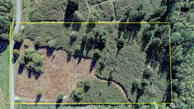 an aerial view of mountain with outdoor space