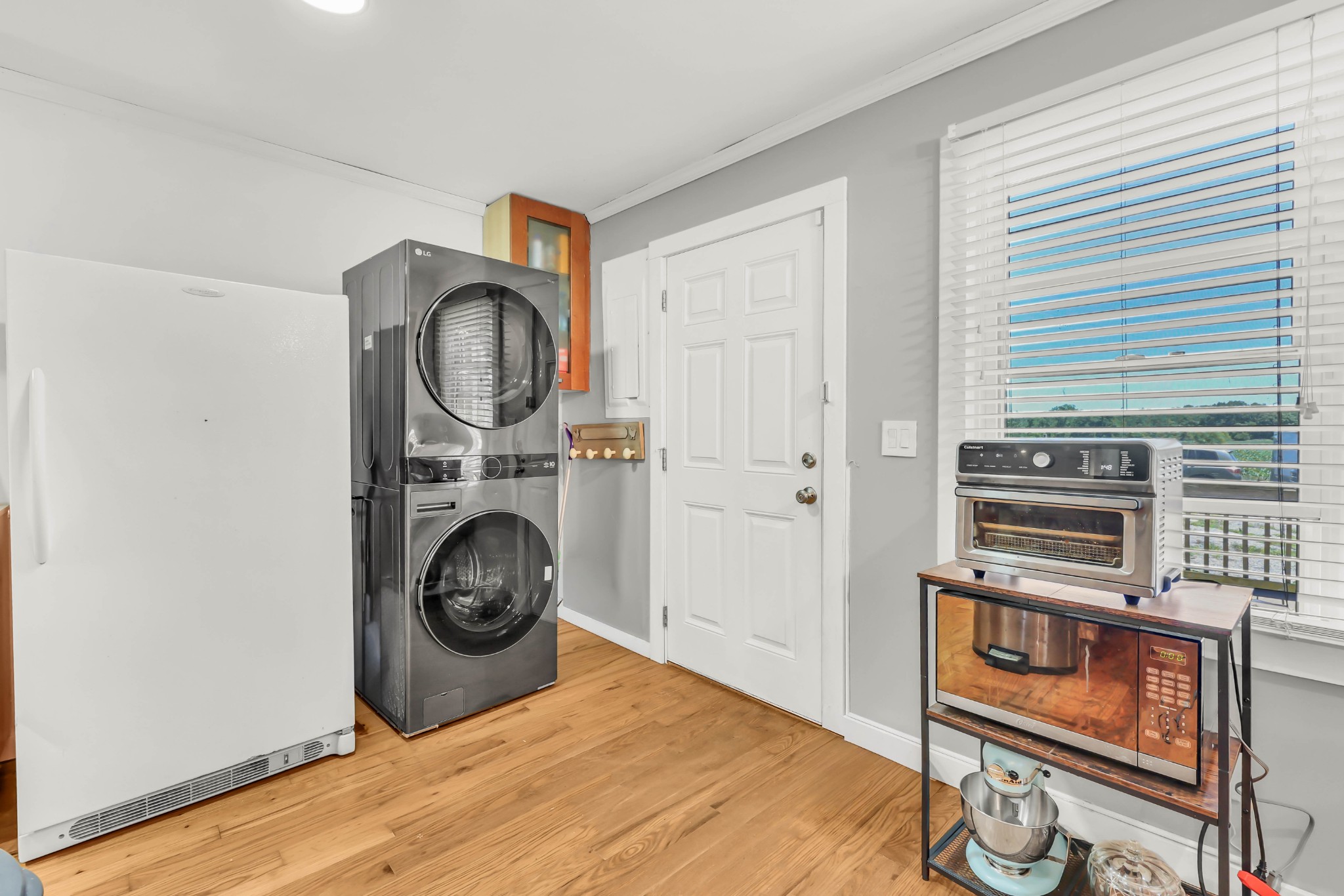 1068 Hugh Hunter Road Oak Grove, KY 42262 - Photo 12 of 30 a view of kitchen and utility room with washer and dryer