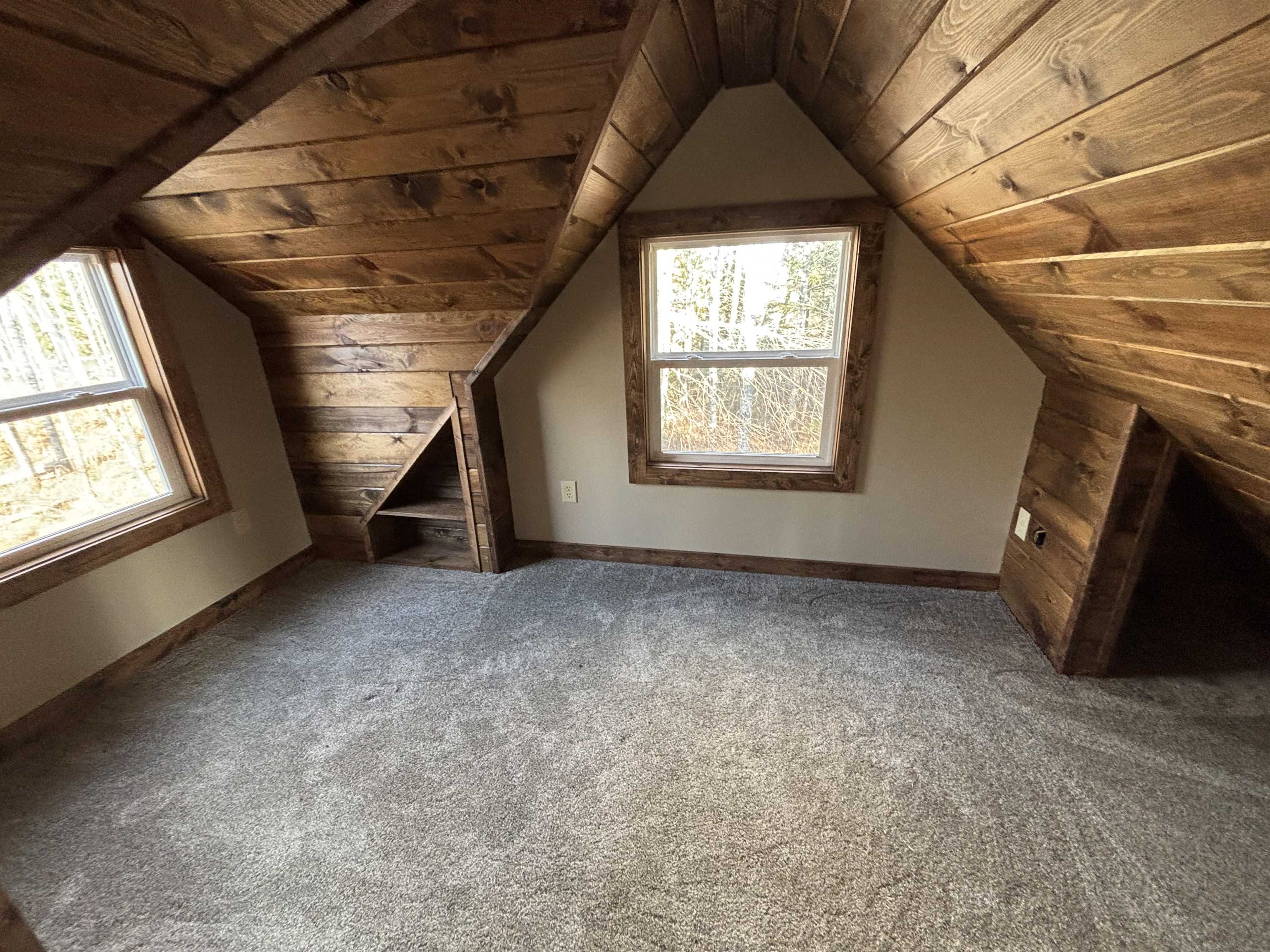 3746 South Hughes Road Hibbing, MN 55746 - Photo 7 of 10 Bonus room featuring wooden ceiling, carpet, and lofted ceiling