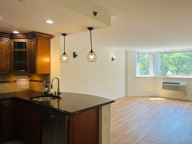 a bathroom with a sink vanity and a mirror