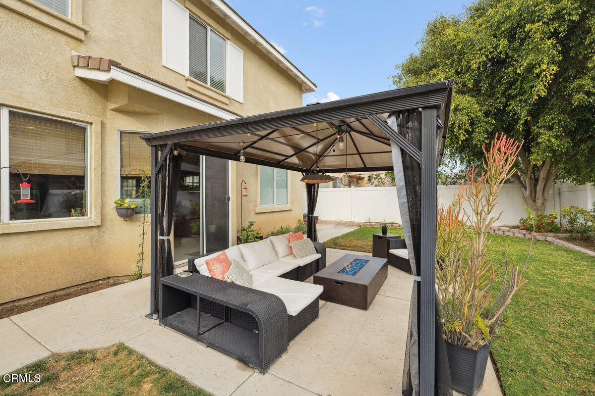 76 Orient Street Fillmore, CA 93015 - Photo 33 of 34 a outdoor space with patio couch and a potted plant