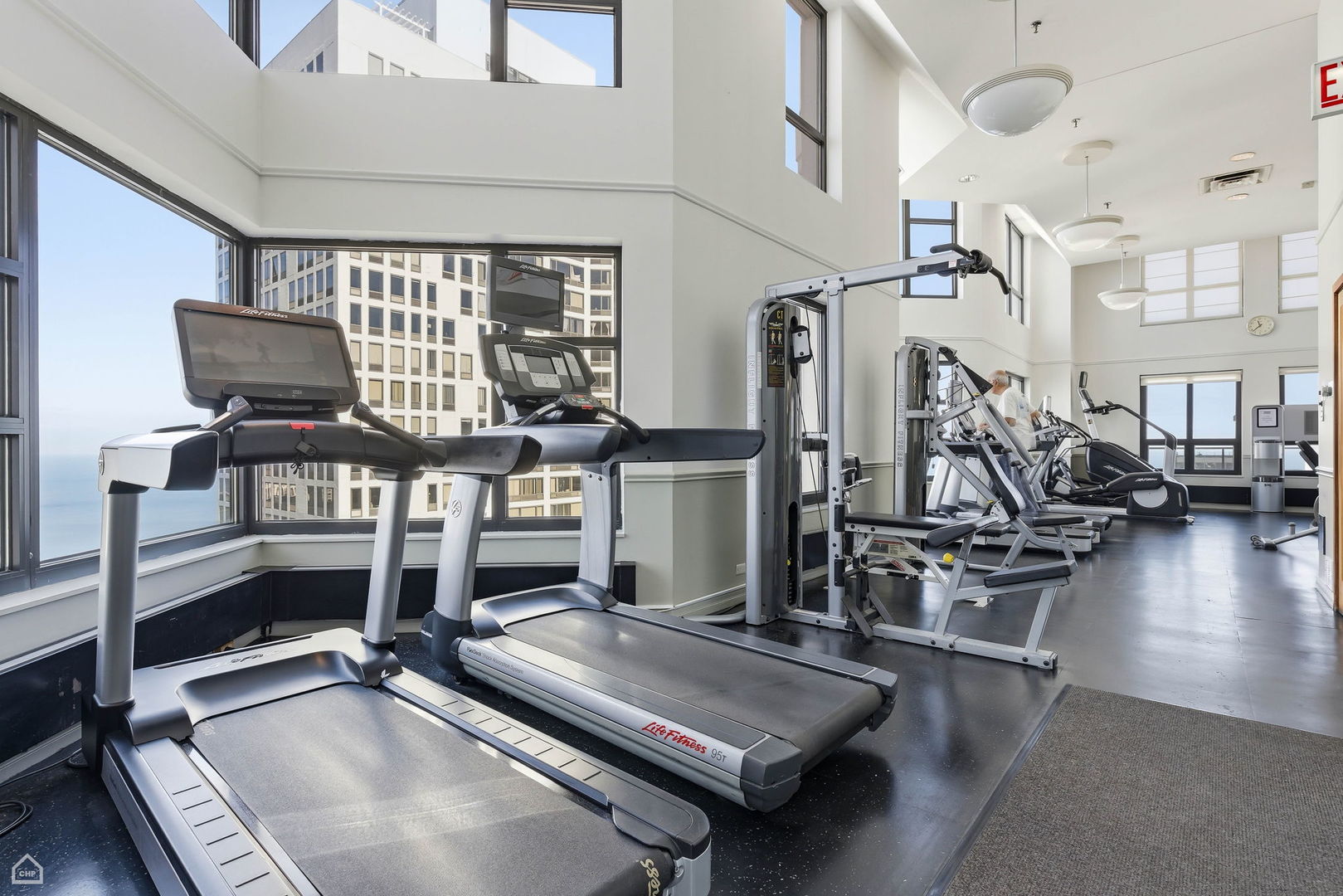 401 East Ontario Street, Unit 710 Chicago, IL 60611 - Photo 29 of 36 a room with lots of gym equipment