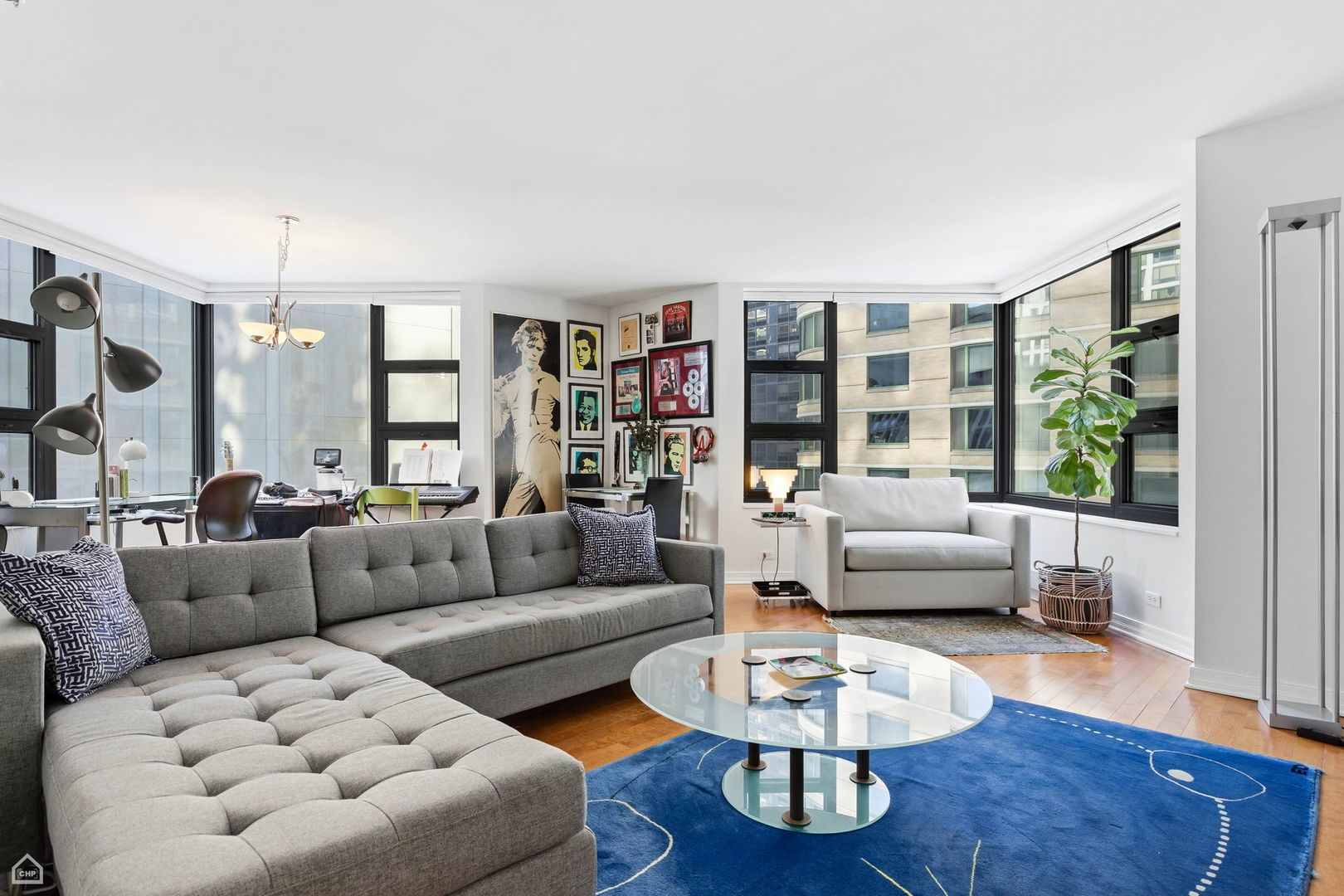 401 East Ontario Street, Unit 710 Chicago, IL 60611 - Photo 3 of 36 a living room with furniture and a large window