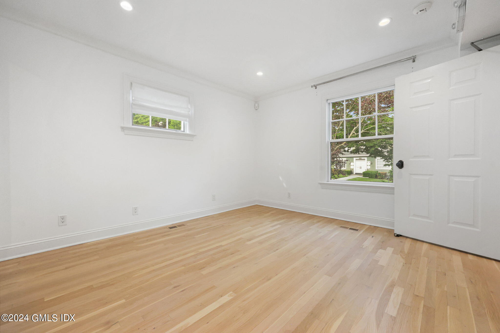 6 Benedict Place Greenwich, CT 06830 - Photo 11 of 16 an empty room with a window