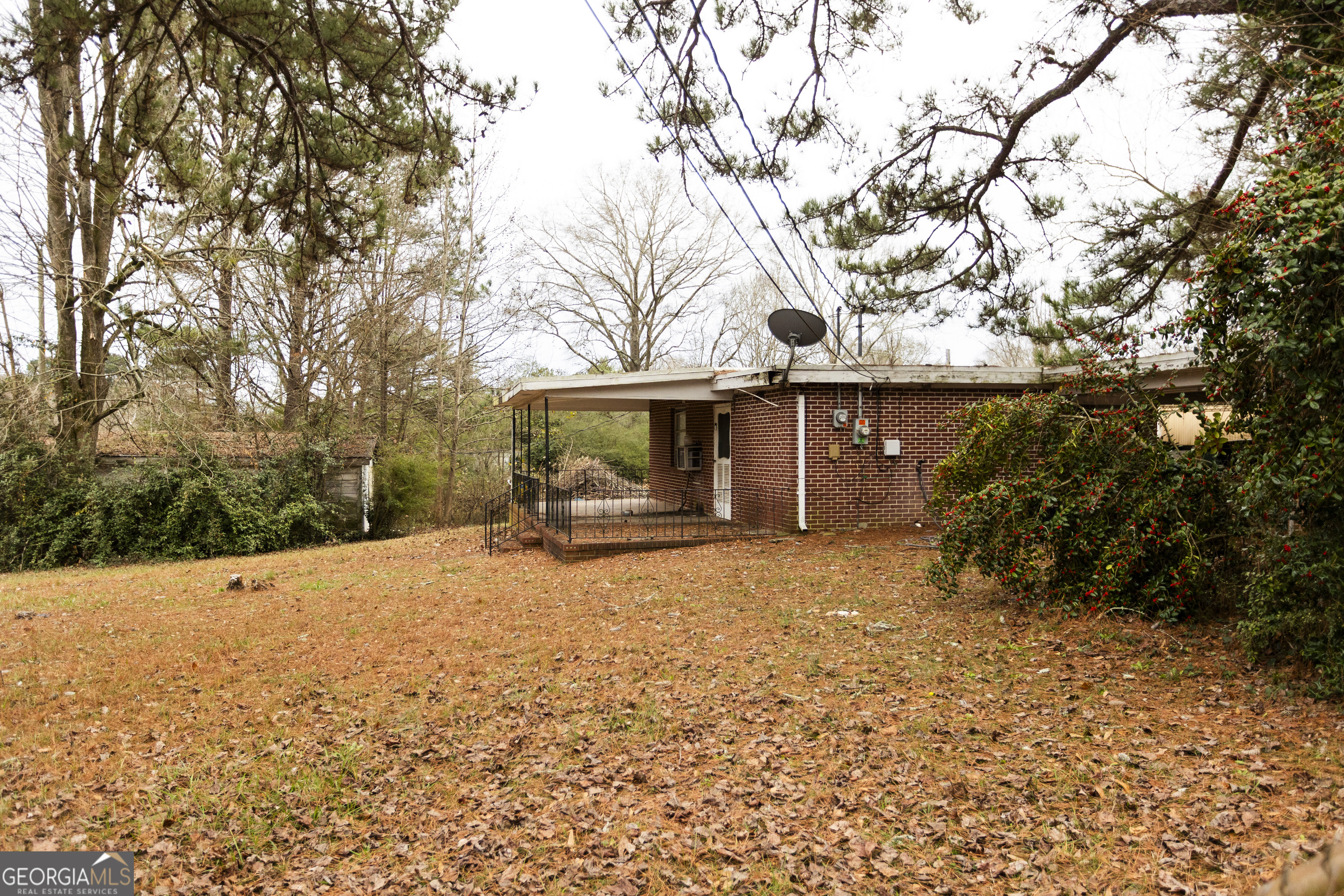 20 East Dollar Circle Covington, GA 30014 - Photo 11 of 31 a front view of a house with a yard and garage