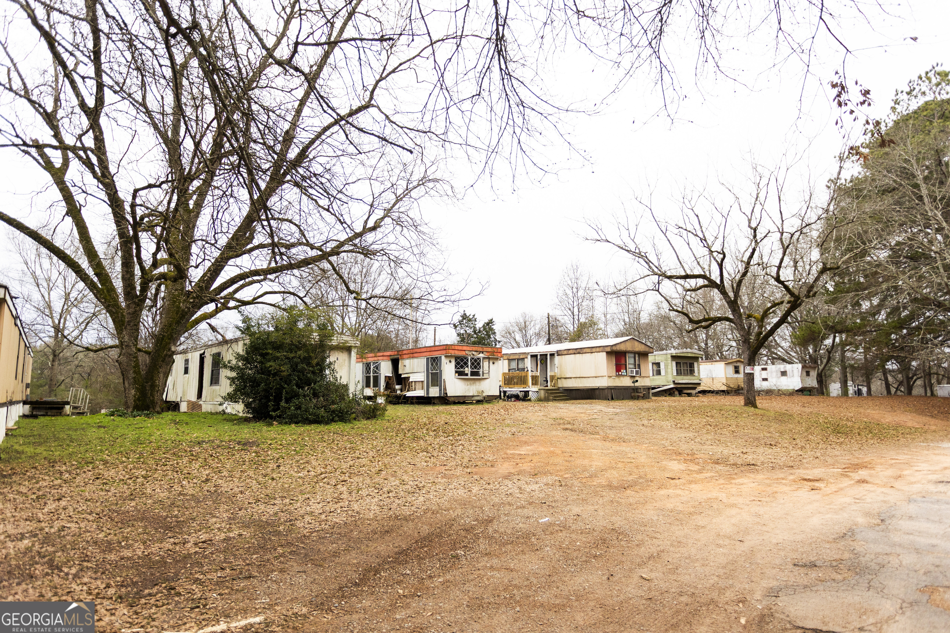 20 East Dollar Circle Covington, GA 30014 - Photo 13 of 31 a view of a yard with a house and trees