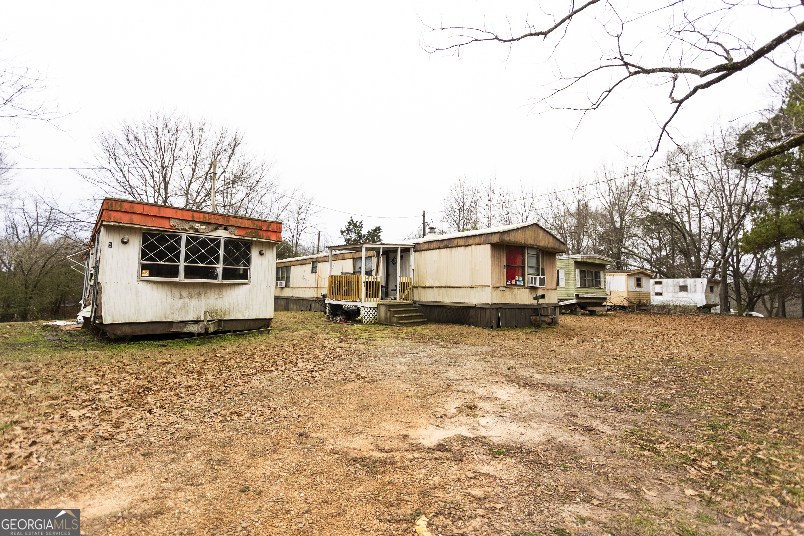 20 East Dollar Circle Covington, GA 30014 - Photo 16 of 31 a house view with a car park in front of it
