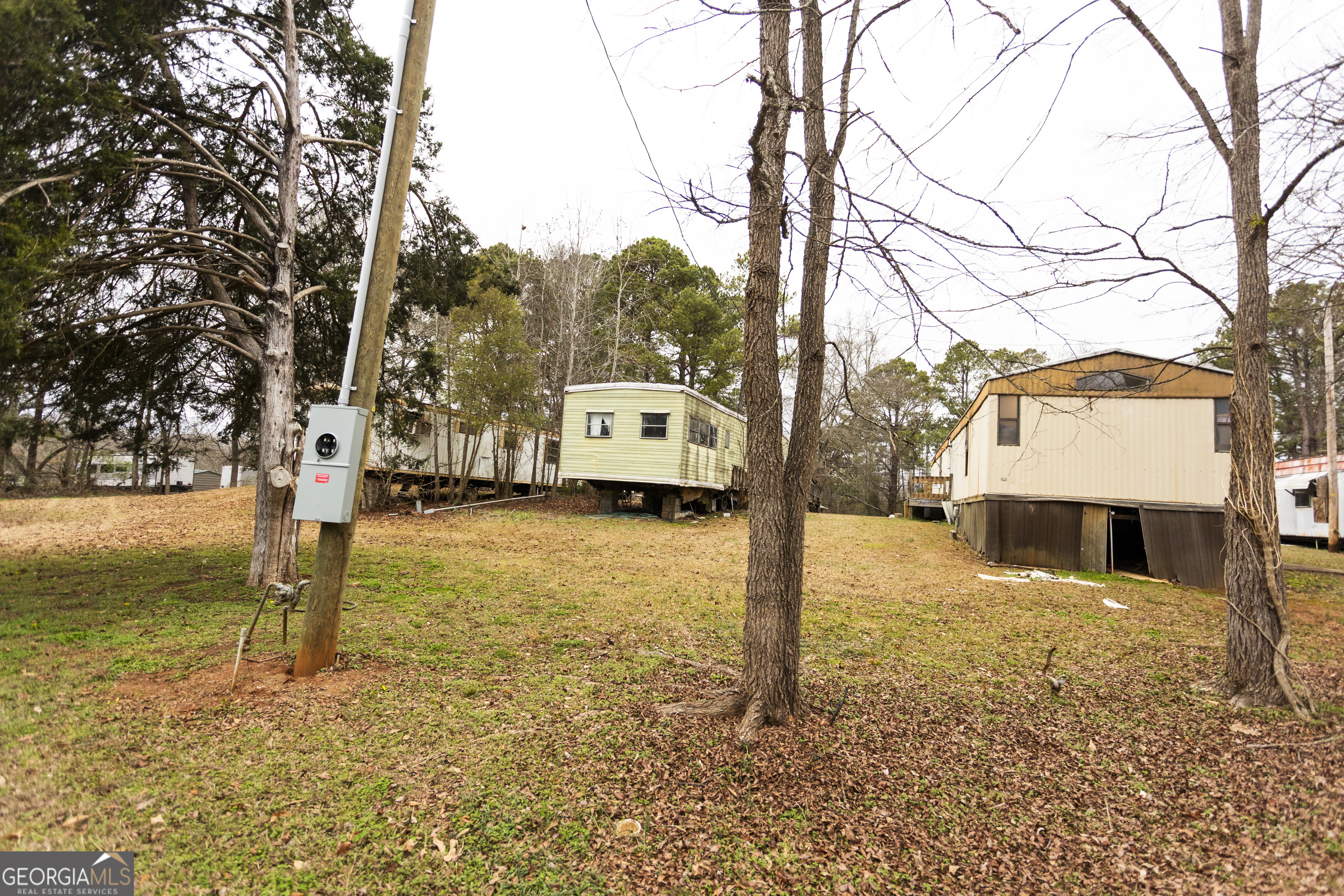 20 East Dollar Circle Covington, GA 30014 - Photo 23 of 31 a view of a street with trees